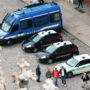 Milano, Italia - 01 June, 2011 Auto di polizia car, carabinieri e vigili urbani parcheggiate in una piazza di Milano