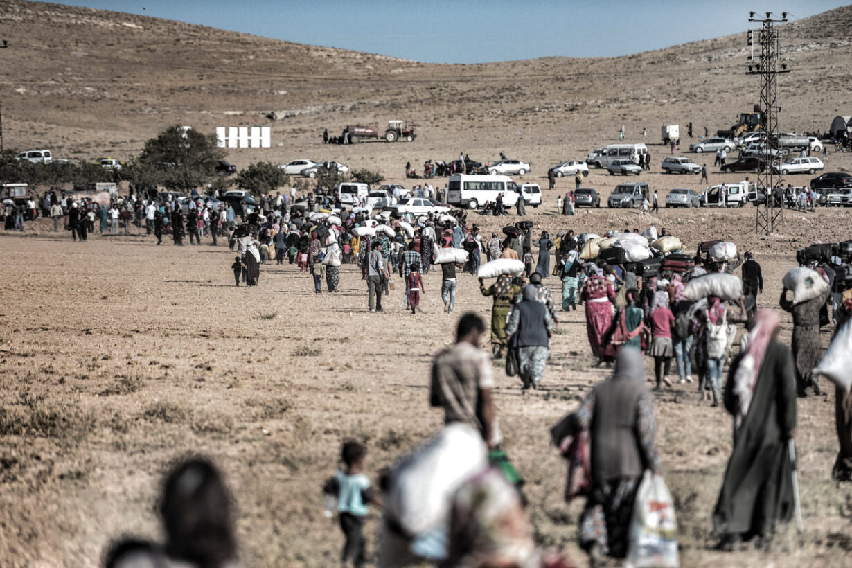 Rifugiati in fuga dalla Siria verso la Turchia